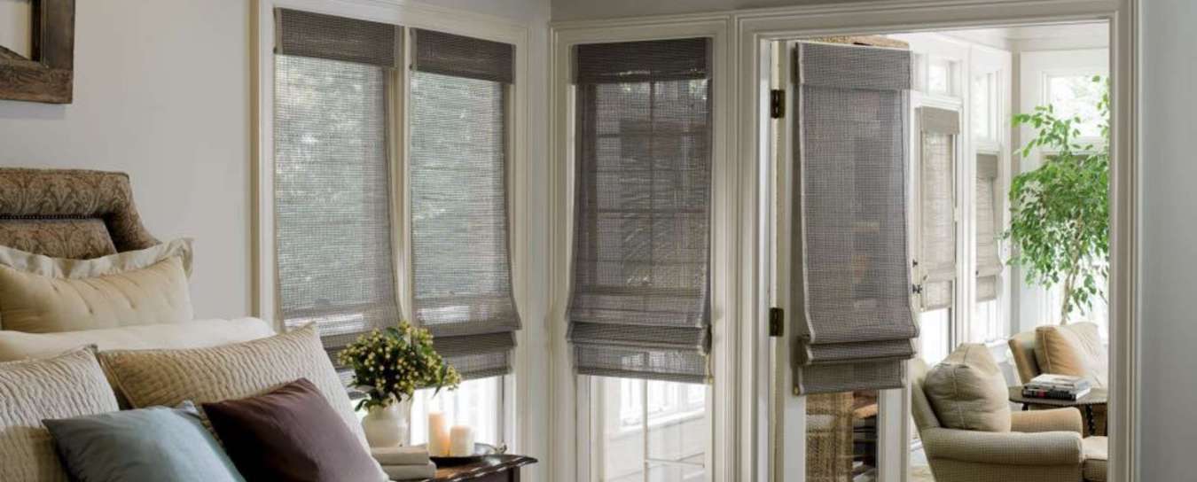 Woven shades in bedroom